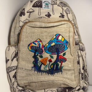 Cream canvas backpack hand block printed with mushrooms, view 1
