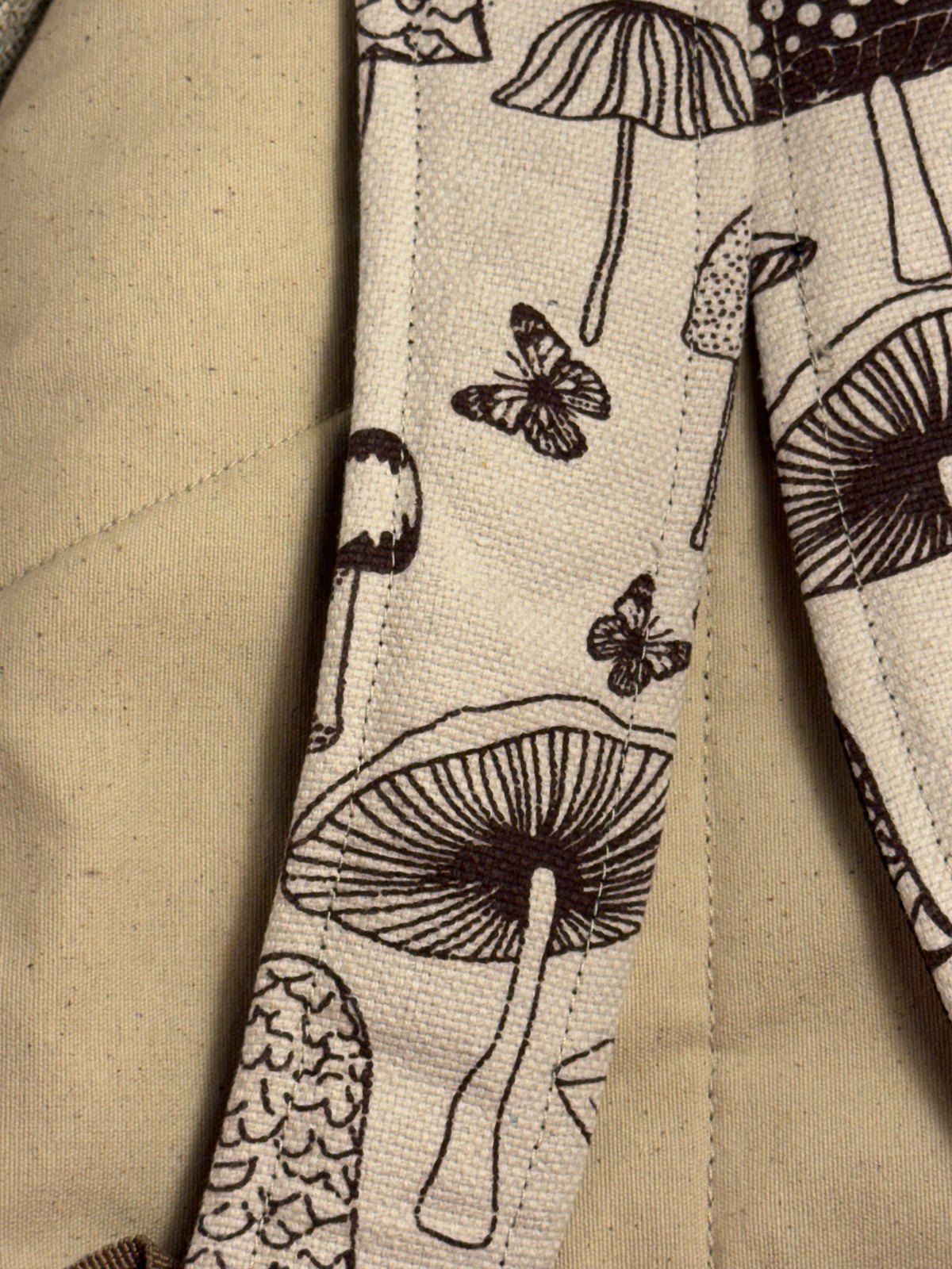 Cream canvas backpack hand block printed with mushrooms, view 2