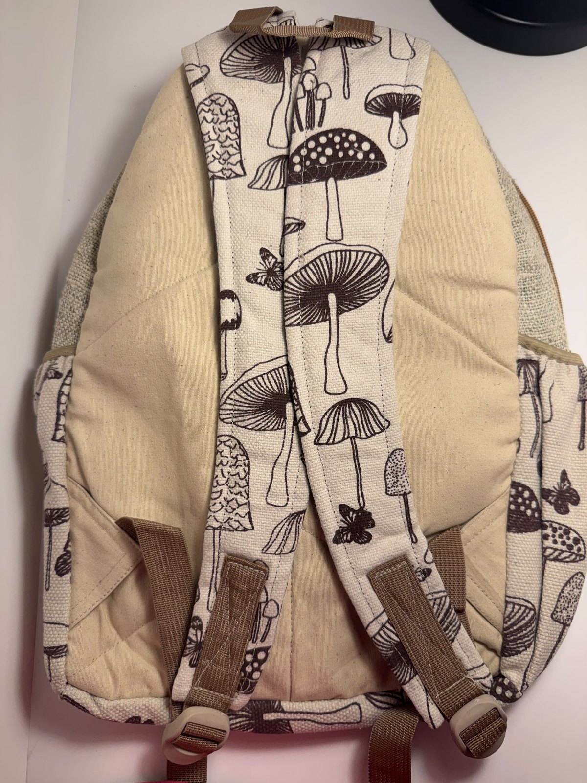 Cream canvas backpack hand block printed with mushrooms, view 6