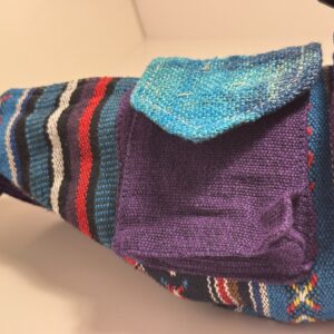 Mauve striped hemp messenger bag with woven teal trim