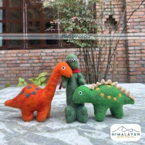 Handmade felt dinosaur plush set from Nepal, view 1