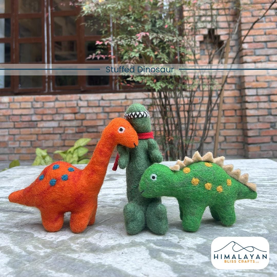 Handmade felt dinosaur plush set from Nepal, view 1