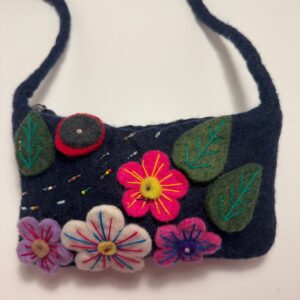 Navy wool felt shoulder bag with hand stitched felt flowers, view 1