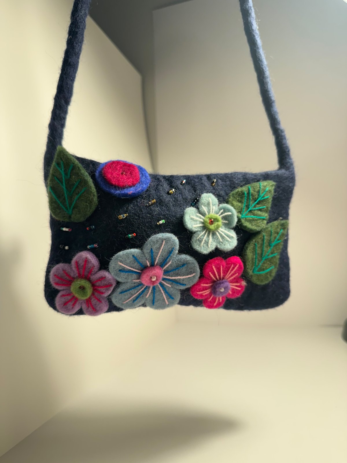 Navy wool felt shoulder bag with hand stitched felt flowers, view 4