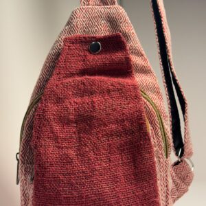 Brick red herringbone hemp sling backpack, view 1